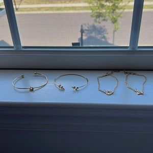 4 bracelets, gold color